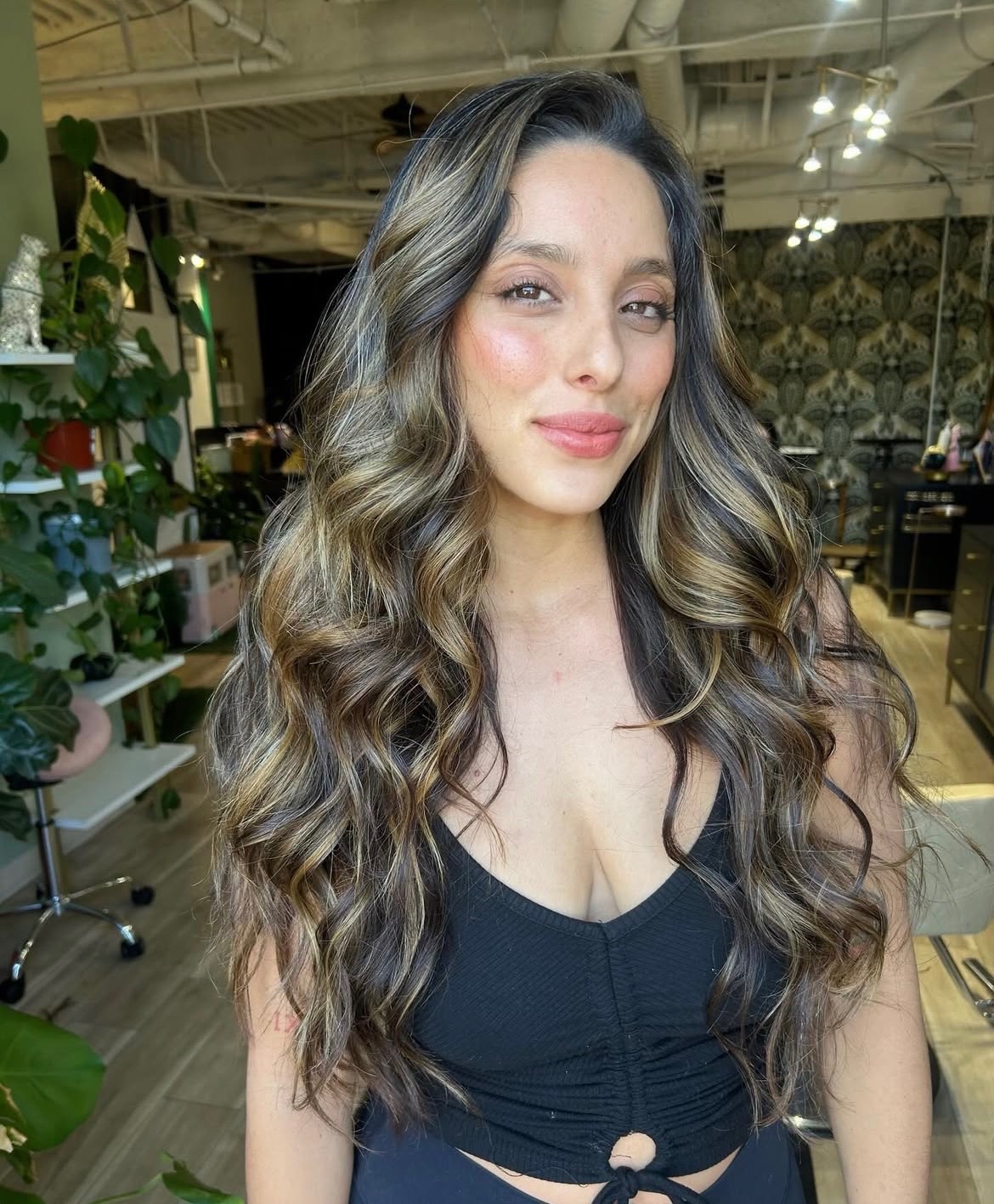 Stylist working on a client at Jack and Frank Hair Studio